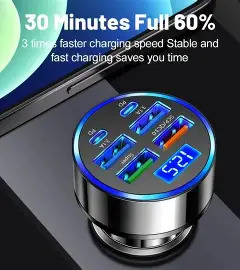Round multi-port car charger with voltage display in a car socket